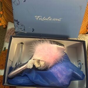 Never worn new in box pink feather heels